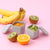Miniware Grow Bento in Chrome with 2 silipods in Peach