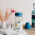 beaba-wide-neck-glass-bottle-240ml-yellow-blue-crown (4)