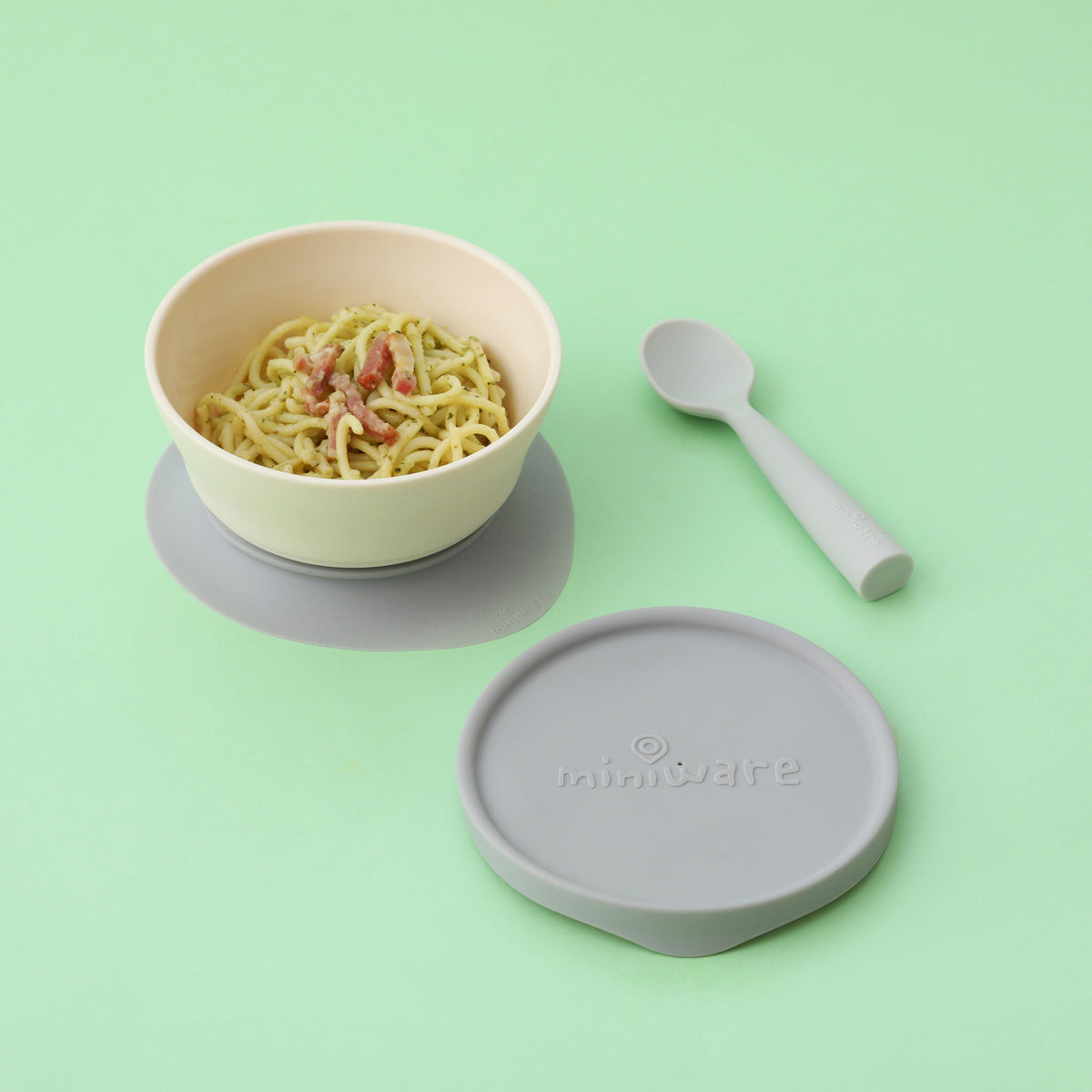 miniware-first-bite-set-pla-cereal-suction-bowl-vanilla-+-silicone-spoon-and-cover-in-cotton-grey- (12)